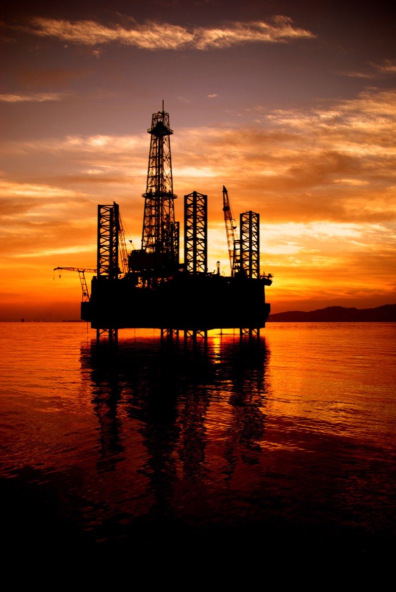 Oil & Gas — offshore drilling platform at sunset